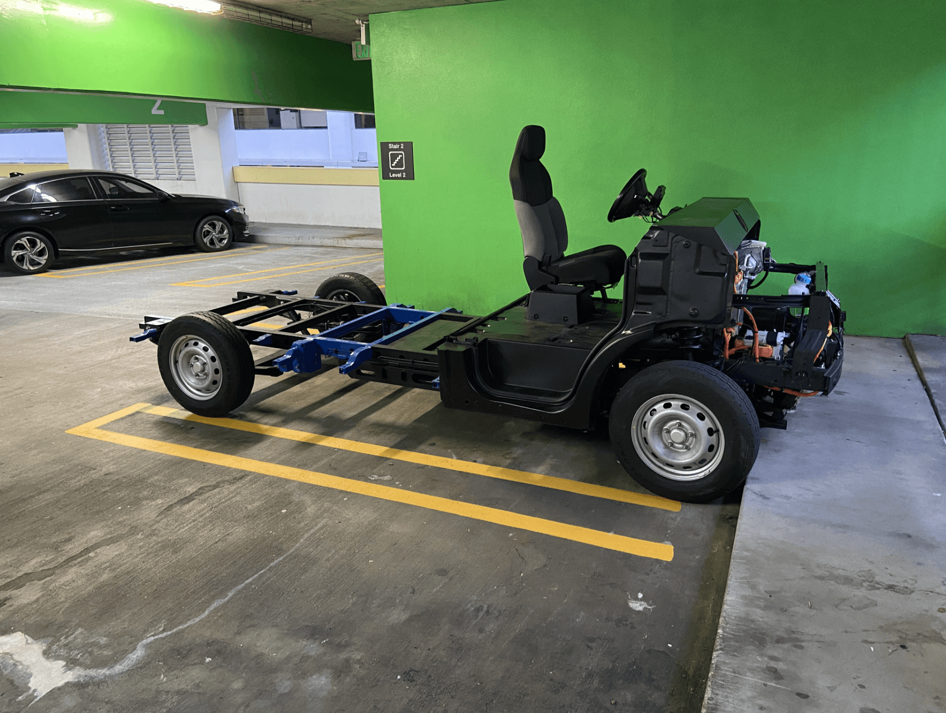 Customer viewing the EV skateboard platform