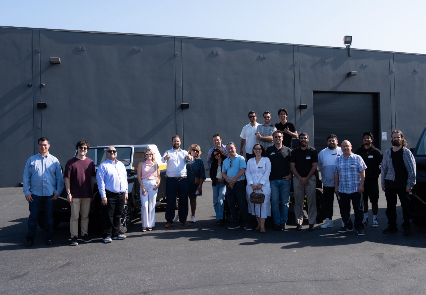 Guests meeting the Olympian Motors team at the Los Angeles roadshow